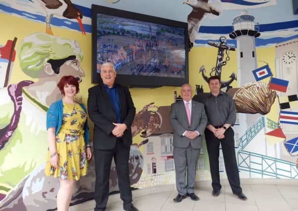 From left to right at Hartlepool Railway Stations Information Point are artist Suzie Devey, Councillor Kevin Cranney, Councillor Dave Hunter, chair of the Headland & Harbour Community Coastal Team and Jeff Newton of Infotech.