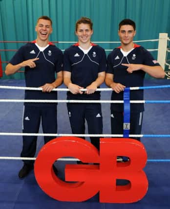 Pat McCormack (left), Savannah Marshall and Josh Kelly (right) during the Olympics team announcement at the English Institute of Sport, Sheffield. Picture: Rui Vieira/PA Wire