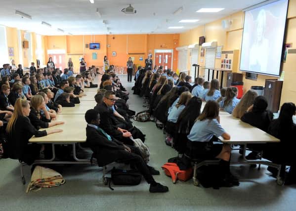 Pupils listening to JK Rowling read during the record attempt on National Book Day held at High Tunstall College of Science. Photograph by FRANK REID