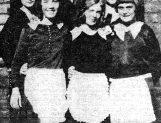 Usherettes in their uniforms.