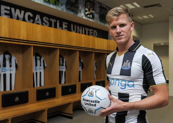 Matt Ritchie sports Newcastle's new home kit after joining the Magpies yesterday