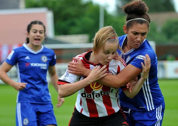 Beth Mead is held back by the Chelsea defence in the midweek defeat. Picture by FRANK REID