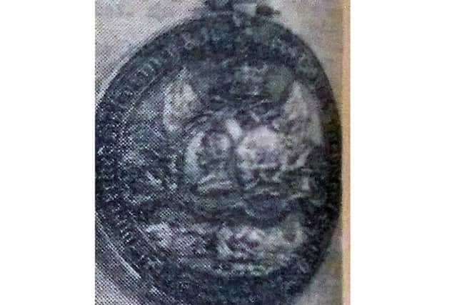 The medal given to George Nossiter.