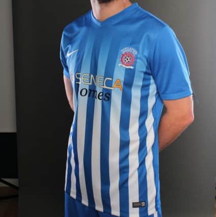 Padraig Amond wears the new kit. Pic: HUFC.