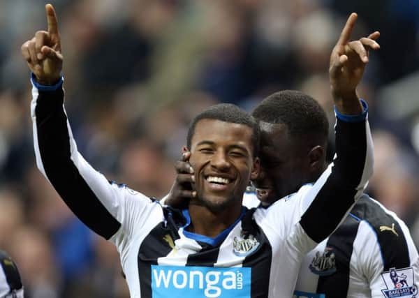 Newcastle United's Georginio Wijnaldum celebrates  with Moussa Sissoko (right)