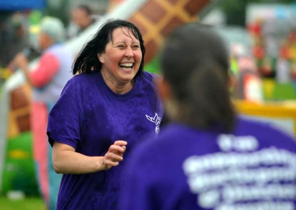 Hardy competitors were all smiles as they battled to stay the course to boost a worthy cause.