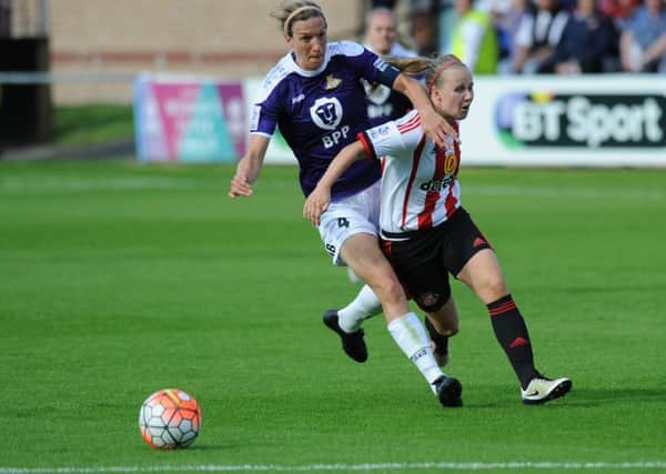 Sunderland Ladies Beth Mead is brought down by Doncaster Rovers Belles skipper Leandra Little. Picture by TIM RICHARDSON