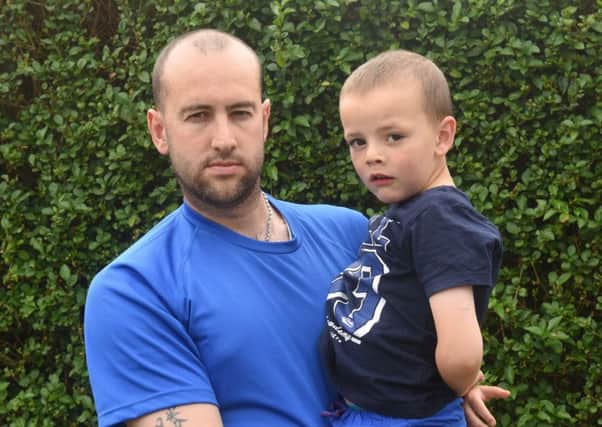 Steve Young, of Wansbeck Gardens, Hartlepool, who has kept his children off school after he was attacked by seagulls in the school yard which cut his head. Steve is pictured with Cobie.