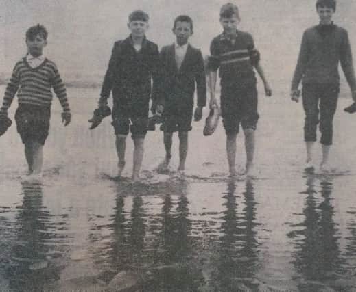 Having a good old paddle in the waters of Crimdon in 1964.