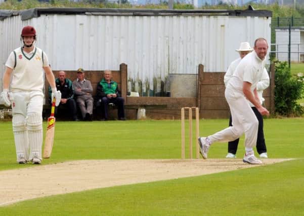 Seaton Carew bowler John Fitzpatrick takes the wicket of Stokesley batsman Andrew Wheel with this over at Hornby Park on Saturday. Picture by Tom Collins.
