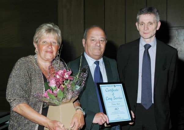 From left, Trevor with wife Pauline and Paul Lynch, Regional Director North