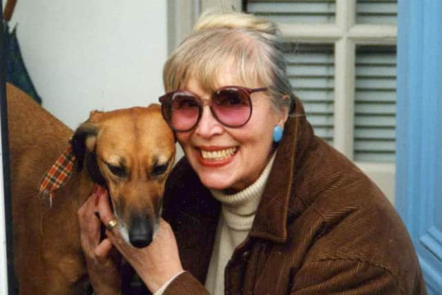 Marion pictured with one of her many beloved pets.