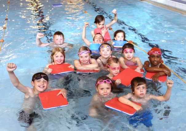 Youngsters having fun at the Mill House Leisure Centre pool - home of the councils free swims scheme.