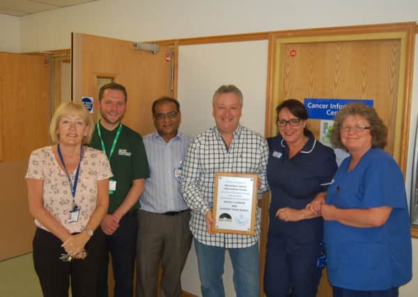 From left to right, Jan Harley (lead cancer nurse), Alan Chandler (Macmillan iformation and survivorship manager), Anil Agarwal (consultant surgeon), Tony Larkin (founder of MusicvCancer), Gill Trainer (colorectal nurse specialist) and Angela Lee (specialist nurse).