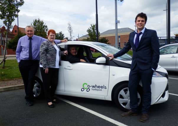 Peter Gowland of HartlePower with Councillor Marjorie James and Paul Hewitson, also of HartlePower, with Councillor Kevin Cranney in the driving seat.