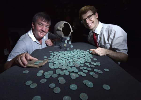 Metal detectorist Dave Blakey and Andrew Wood, Curator of Numismatics.
 Picture: Anthony Chappel-Ross