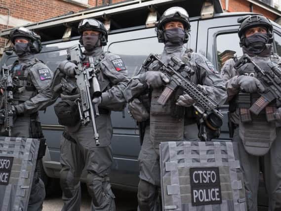 Armed police preparing to deploy from Hyde Park, central London, as Scotland Yard announced that the first of 600 additional armed officers were trained and operationally ready, and unveiled plans to put more marksmen on public patrol. (Photo: PA)