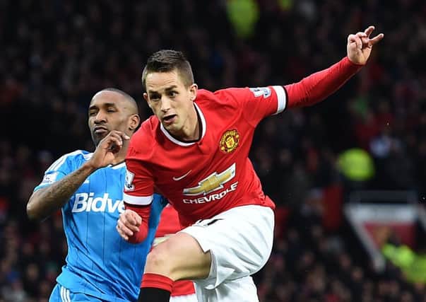 Manchester United's Adnan Januzaj has a shot on goal during the Barclays Premier League match at Old Trafford, Manchester. PRESS ASSOCIATION Photo. Picture date: Saturday February 28, 2015. See PA story SOCCER Man Utd. Photo credit should read: Martin Rickett/PA Wire. RESTRICTIONS: Editorial use only. Maximum 45 images during a match. No video emulation or promotion as 'live'. No use in games, competitions, merchandise, betting or single club/player services. No use with unofficial audio, video, data, fixtures or club/league logos.