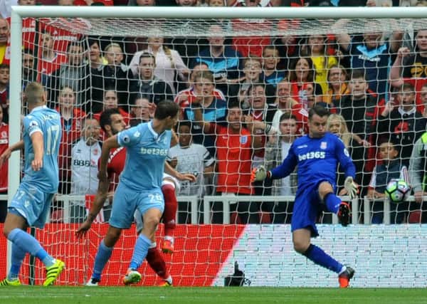 Alvaro Negredo beats Stoke City goalkeeper Shay Given to put Boro in the lead at the Riverside on Saturday. Pic by Tom Collins.