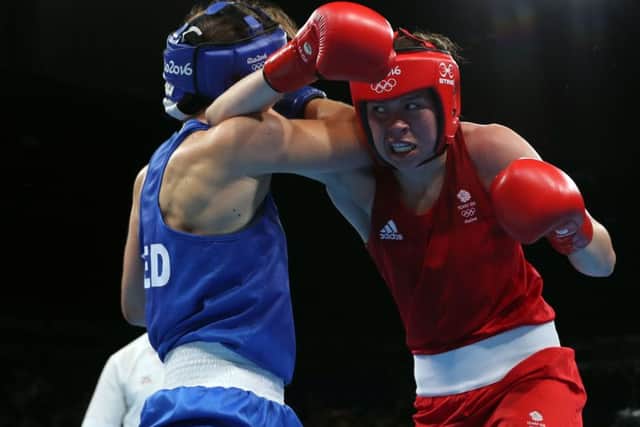 Great Britain's Savannah Marshall in action against Netherlands' Nouchka Fontijn during the Women's middle 75 kg Quarter Final on the twelfth day of the Rio Olympics Games, Brazil. PRESS ASSOCIATION Photo. Picture date: Wednesday August 17, 2016. Photo credit should read: David Davies/PA Wire. EDITORIAL USE ONLY