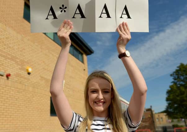 Poppy Stuart from English Martyrs School and Sixth Form College with her results. Picture by FRANK REID