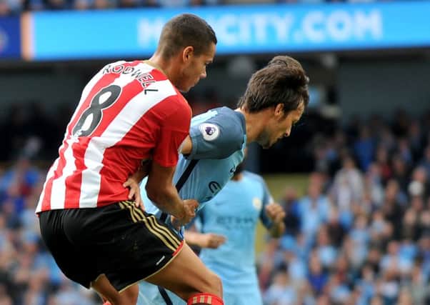 Jack Rodwell keeps close tabs on David Silva at Manchester City. Picture by Frank Reid