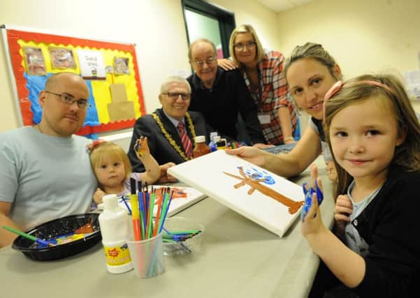 Belle Vue Sports Community Youth Centre's Family Relational activity day, making family trees are Ashley Brown and daughter Mia, the Mayor Coun Rob Cook, centre manager Alex Sedgwick, nursery manager Claire Wainwright, and Kirsty Bain with daughter Bethany.