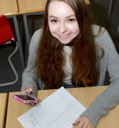 Olivia Bennison with her GCSE at English Martyrs School Picture by FRANK REID