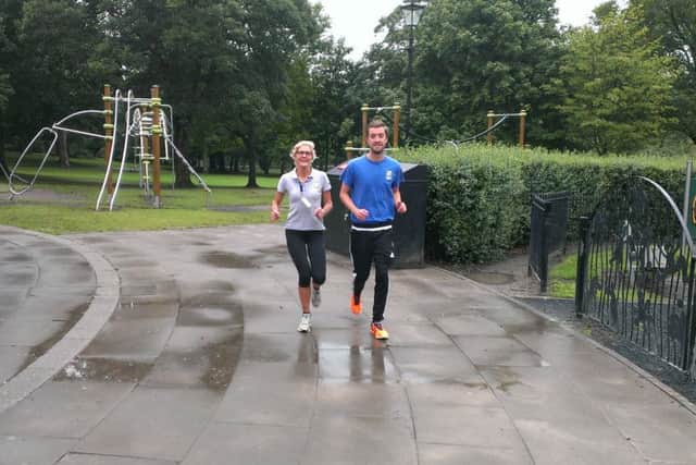 Setting an example to the runners are Kay Stokes and Matthew Stoddart.