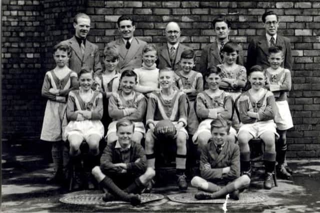 Joe, bottom left, with the 1947 Brougham School under 11s football team.