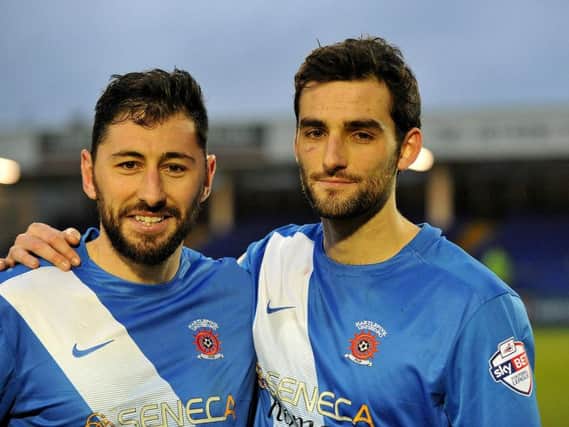 Adam Jackson (right) with Pools skipper Billy Paynter