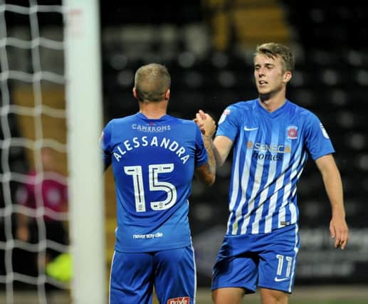Rhys Oates (right) thanks Lewis Alessandra for setting him up with his goal at Notts County. Picture by FRANK REID