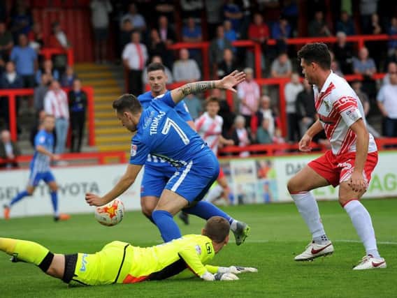 Before it all went wrong: Nathan Thomas scores at Stevenage. Picture by FRANK REID