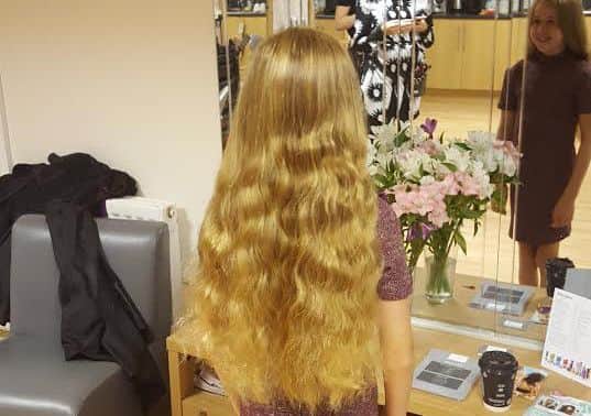 BEFORE: Rosie cut off her long hair to donate to the Little Princess Trust and raise money for youngster Bradley Lowery.