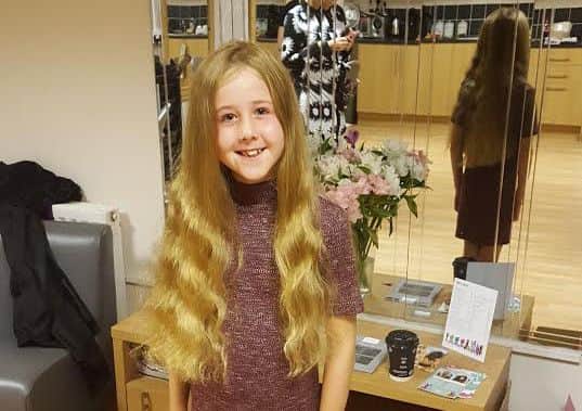 BEFORE: Rosie cut off her long hair to donate to the Little Princess Trust and raise money for youngster Bradley Lowery.
