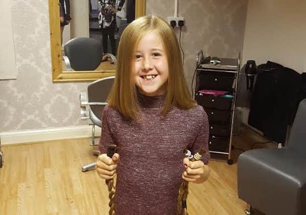 AFTER: Rosie McLean cut off her long hair to donate to the Little Princess Trust and raise money for youngster Bradley Lowery.