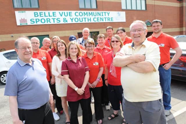 Bob Farrow, front right, with Belle Vue centre staff when it celebrated its 30th anniversary last year.