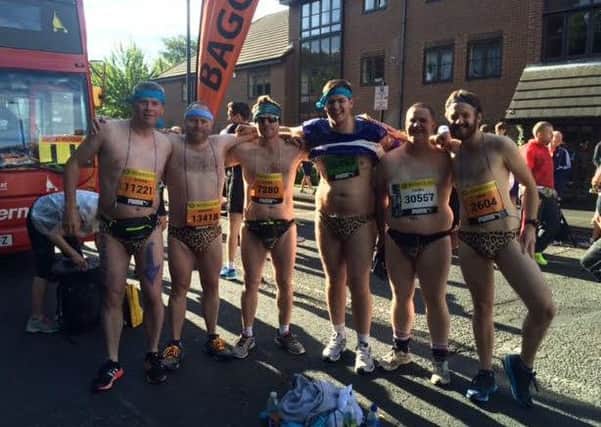 Fund-raisers from SK Foods after they finished last year's Great North Run wearing leopard print Speedos.