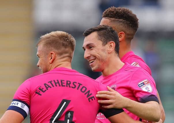 Nathan Thomas is congratulated on his goal at Plymouth