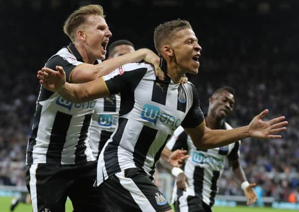 Newcastle United's Dwight Gayle celebrates scoring his side's fourth goal of the game and completing his hat-trick during the Sky Bet Championship match at St James' Park, Newcastle. PRESS ASSOCIATION Photo. Picture date: Wednesday September 28, 2016. See PA story SOCCER Newcastle. Photo credit should read: Owen Humphreys/PA Wire. RESTRICTIONS: EDITORIAL USE ONLY No use with unauthorised audio, video, data, fixture lists, club/league logos or "live" services. Online in-match use limited to 75 images, no video emulation. No use in betting, games or single club/league/player publications.