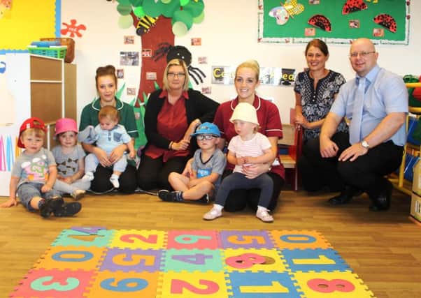 Lesley Huitson and Patrick Crowe, from Hartlepool Borough Councils public protection team, visiting Little Stars nursery.