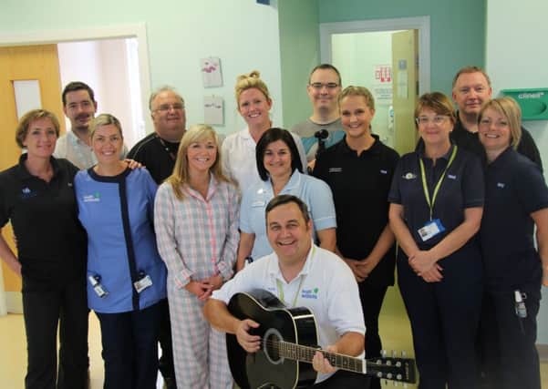 The health team get ready to burst into song.