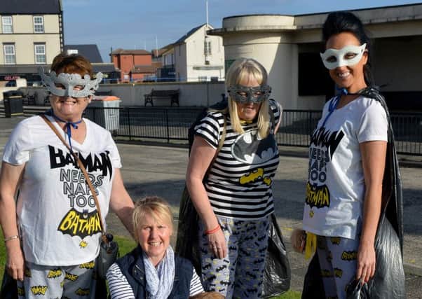 (standing left to right) Brenda Walton, Susan Gravett and Jemma Walton with Angela Armstrong and her dog "Bailey" as they wait to take part in the Bradley Lowery Walk.  Picture by FRANK REID