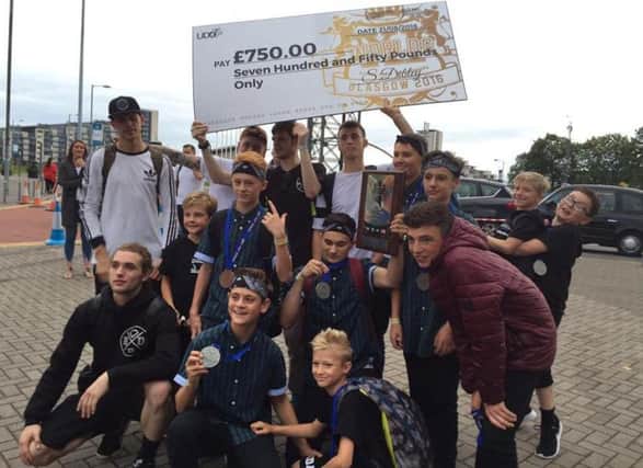 The Rocsquad crew celebrates at the UDO World Streetdance Championships.