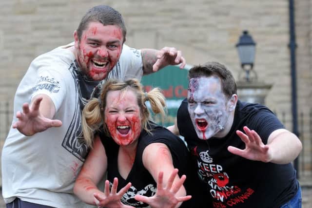 (left to right) Matty Shea, Kate Barratt and Chris Griffiths who are taking part in the charity Zombie Walk. Picture by FRANK REID
