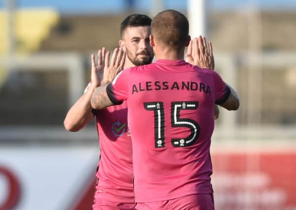 Padraig Amond celebrates his goal with Lewis Alessandra