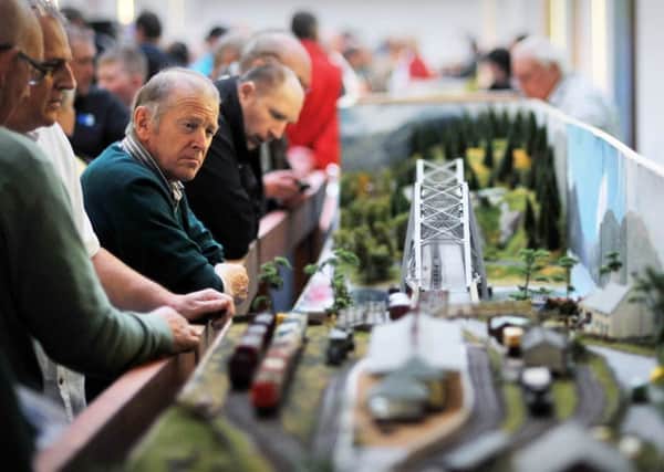Visitors take a look at one of the model railway layouts at the Hartlepool Model Railway Show that was held at the College of Further Education.