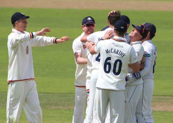 Durham celebrate a wicket in the county championship this season