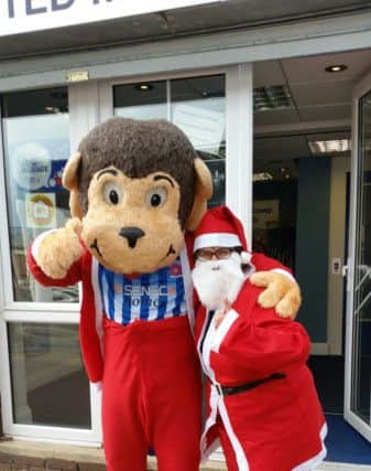H'Angus and Janice Forbes get ready for this year's Santa run.