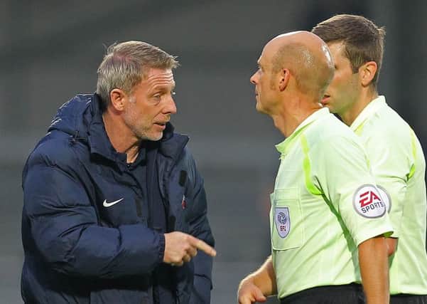 Craig Hignett has words with the referee at Barnet